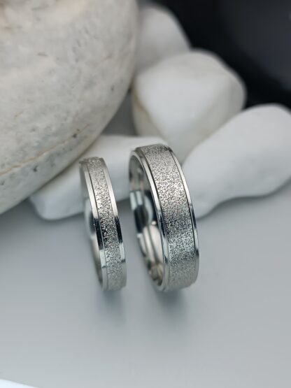 Pair of wedding rings made of steel with a sagre finish and polished edges (CODE: 0108)