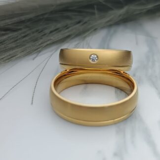 Pair of wedding rings together with a single stone of polished steel and sagre (CODE: 7502)