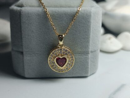 Steel heart necklace in yellow gold