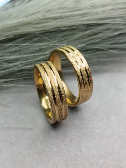 Pair of textured gold wedding rings (CODE:85833)