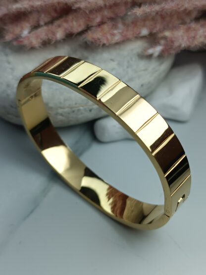 Gold tone steel handcuff bracelet (CODE:053)