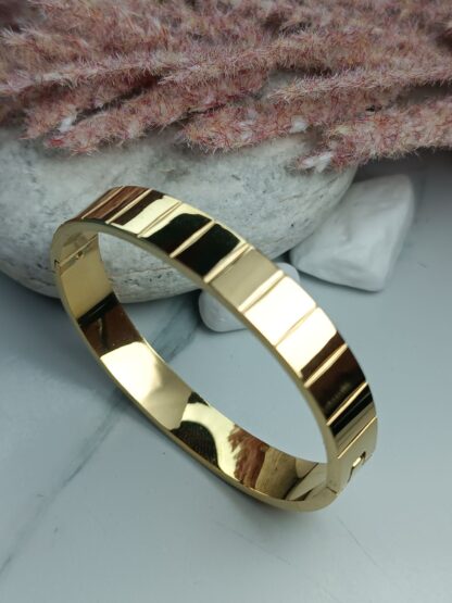 Gold tone steel handcuff bracelet (CODE:053)