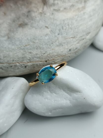 Single stone with blue zircon stones (CODE: 64622)