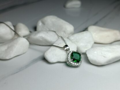 Steel necklace with green stone
