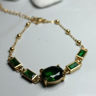 Steel bracelet with green stone
