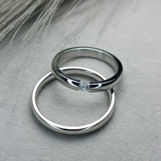 Pair of Matt steel wedding rings with sagre finish and polished edges (CODE: 006881)