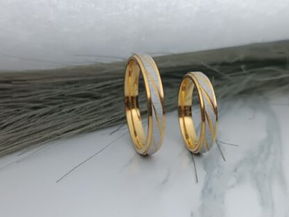 Pair of wedding rings Matt made of steel with sagre finish and luster on the edges (CODE:0125)