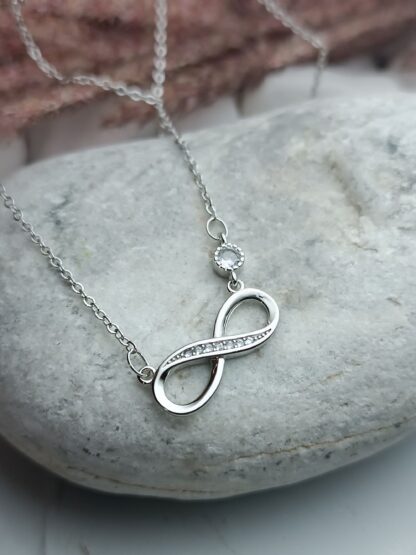 Silver, 925 platinum-plated infinity necklace, decorated with white zircons (CODE:05258)