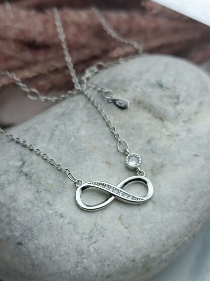 Silver, 925 platinum-plated infinity necklace, decorated with white zircons (CODE:05258)