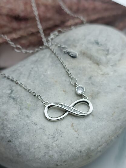 Silver, 925 platinum-plated infinity necklace, decorated with white zircons (CODE:05258)