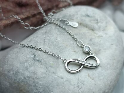 Silver, 925 platinum-plated infinity necklace, decorated with white zircons (CODE:05258)