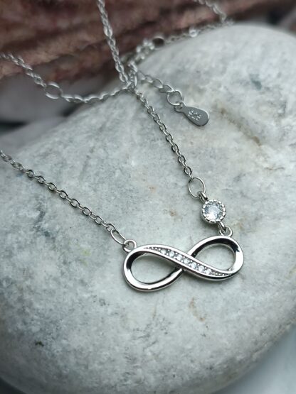 Silver, 925 platinum-plated infinity necklace, decorated with white zircons (CODE:05258)