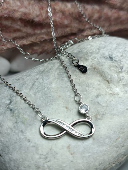 Silver, 925 platinum-plated infinity necklace, decorated with white zircons (CODE:05258)