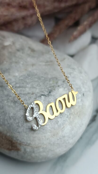 Steel necklace with the name "VASO" gold-plated with zircons in gold color (CODE: 02020)