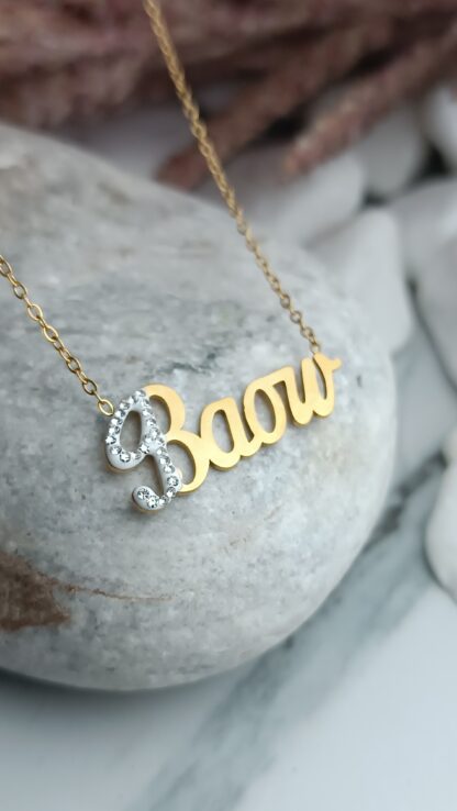 Steel necklace with the name "VASO" gold-plated with zircons in gold color (CODE: 02020)