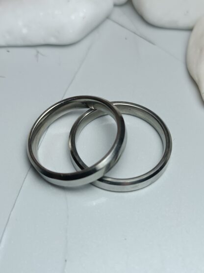 Pair of classic wedding rings made of polished steel 4 mm (CODE: 22201)