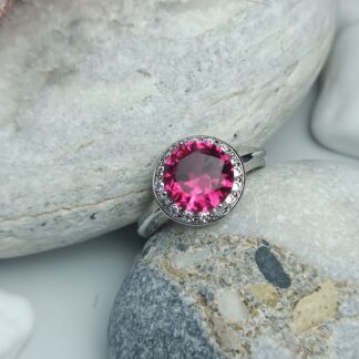 Ring with fuchsia stones Zircon steel (CODE: 22008)