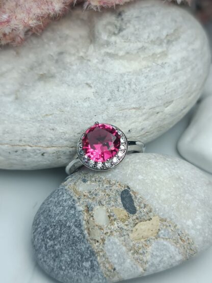 Ring with fuchsia stones Zircon steel (CODE: 22008)